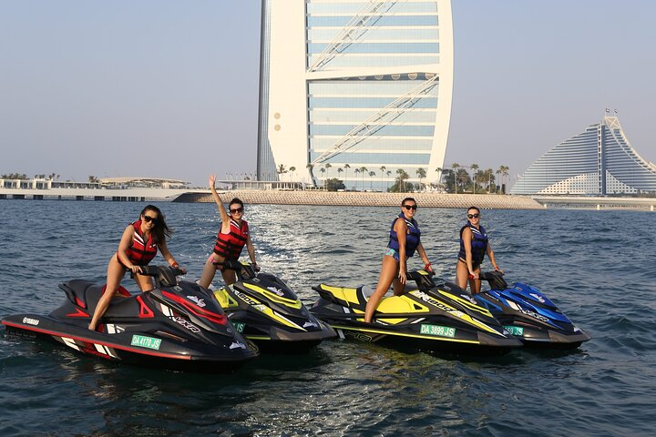 Experience the joy of jet skiing in Dubai gliding past the iconic Burj Al Arab while enjoying stunning views of the skyline and creating unforgettable memories.